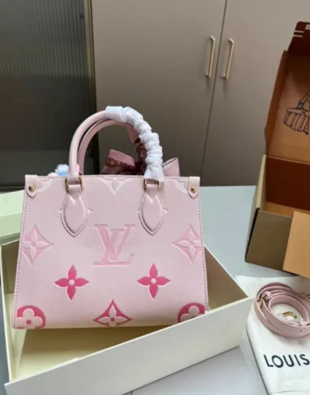 Louis Vuitton Onthego PM Monogram Empreinte Pastel Pink Tote Bag