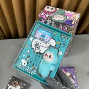 AirPods Pro 2 with Labubu cover and Labubu doll keychain